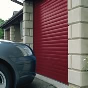 Insulated roller garage door in burgundy – park right up to the door!