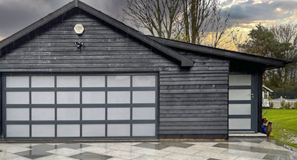 GSA Vision sectional garage door with matching entrance door